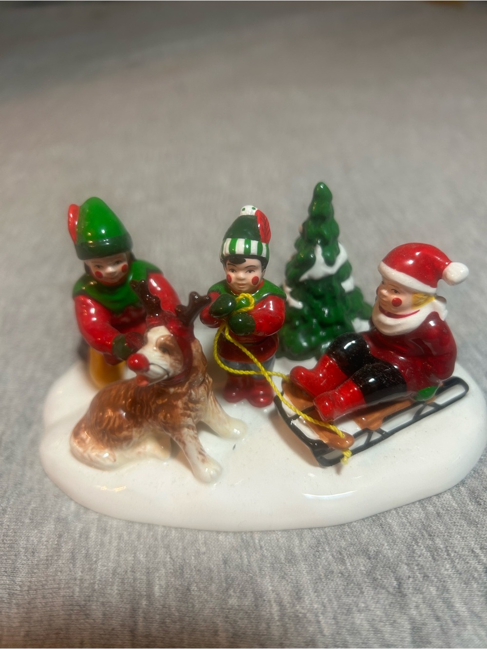 Department 56 Ceramic Santas little helpers - Red, Green, White, Brown